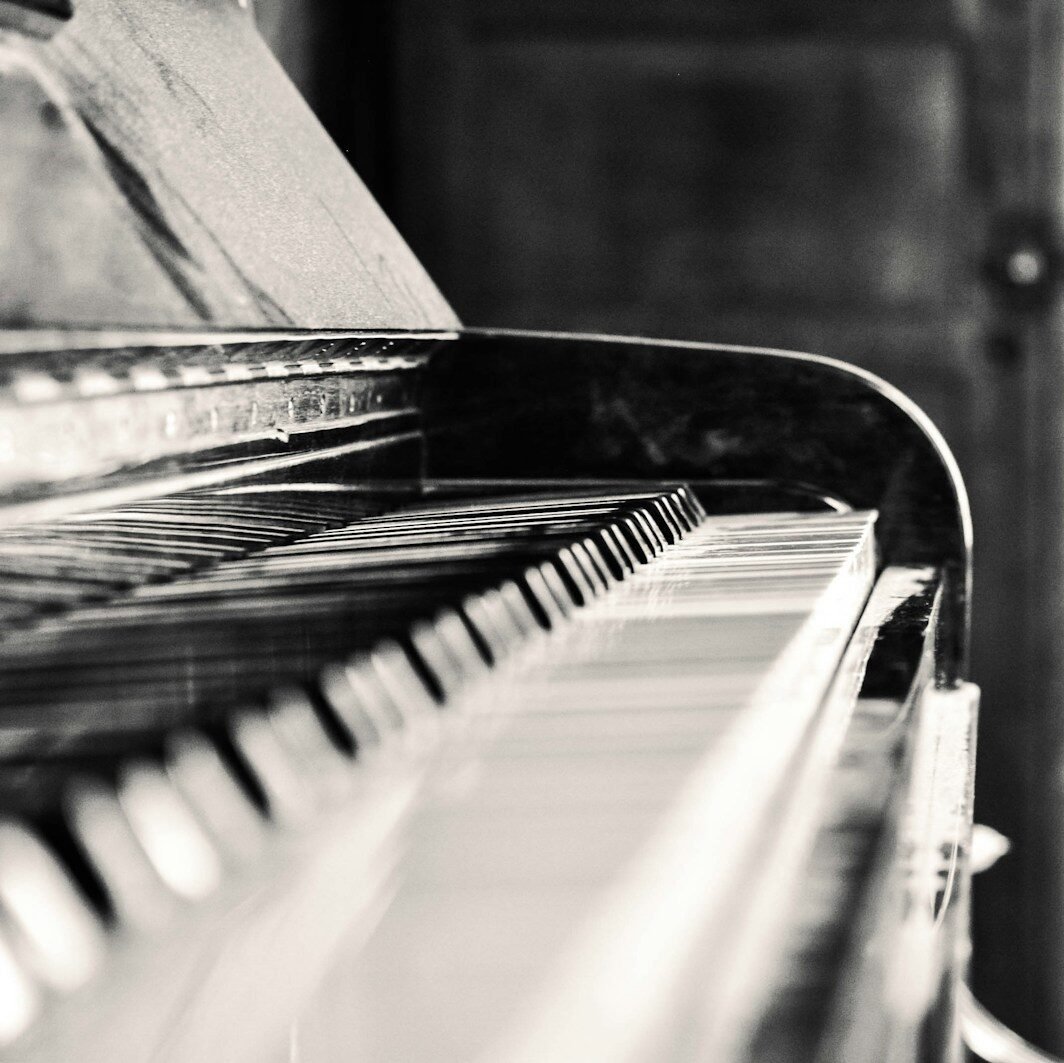 black and white upright piano